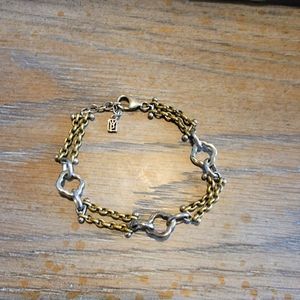 Waxing Poetic sterling silver and brass bracet with 3 clasps. 8" L x 1/2" W.